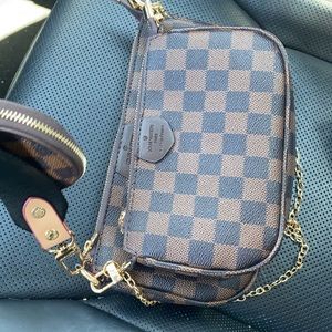 NON AUTHENTIC LV CROSSBODY